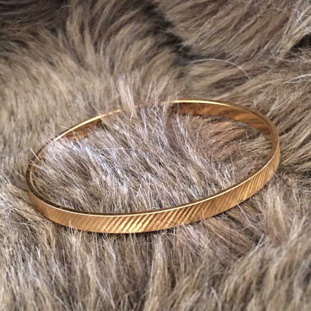 Vintage Monet gold tone pattern bangle bracelet